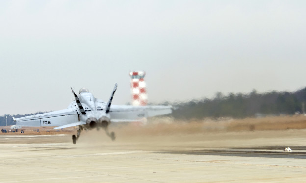 A USN Hornet fighter launched from a 100 metre linear induction motor track, Wallops Island, Virginia.