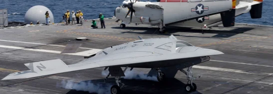 Northrop Grumman X-47B Drone landing on the deck of the carrier George H.W. Bush.