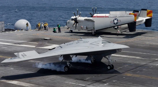 Northrop Grumman X-47B Drone landing on the deck of the carrier George H.W. Bush.